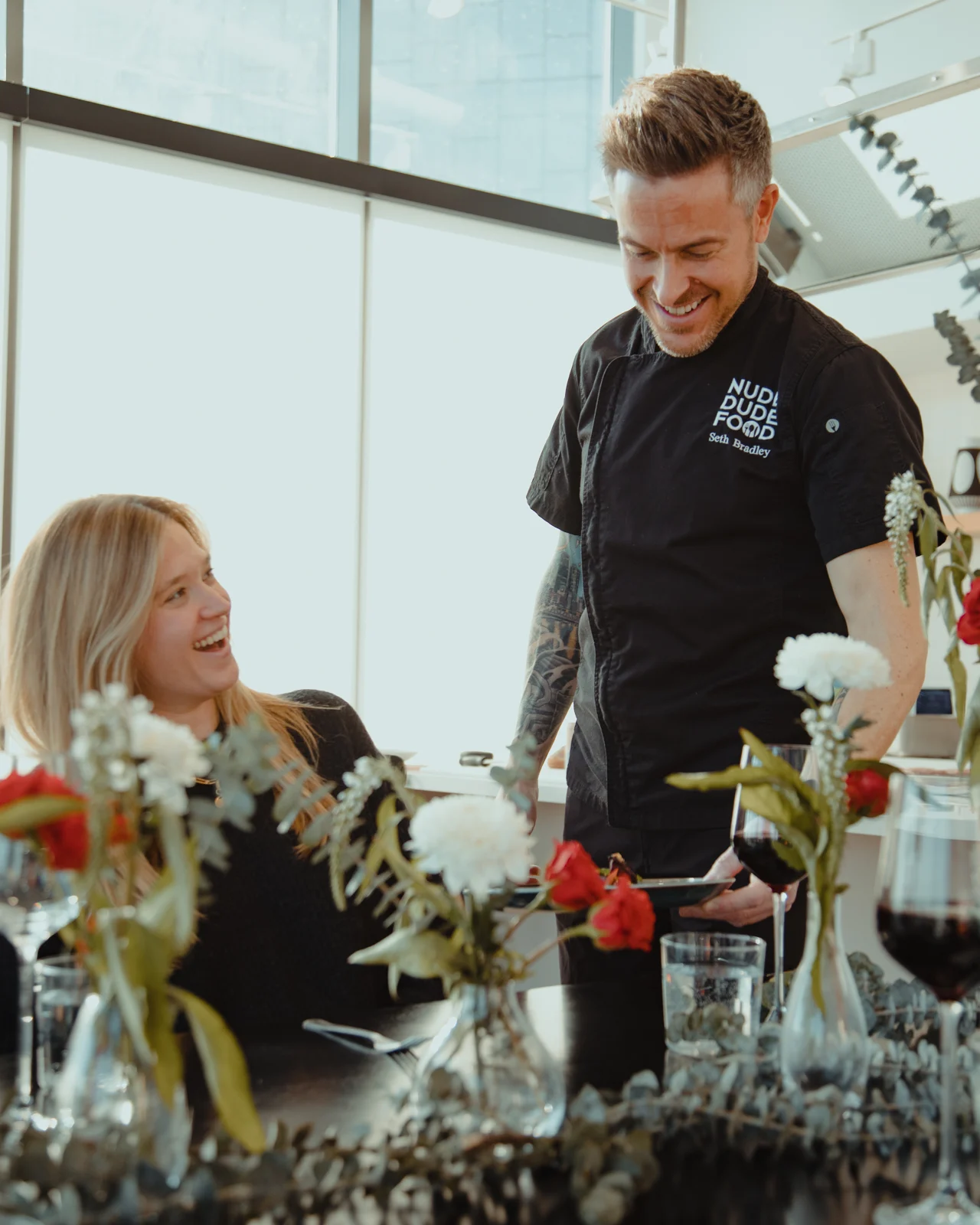 NDF chef serving guests at a private dinner